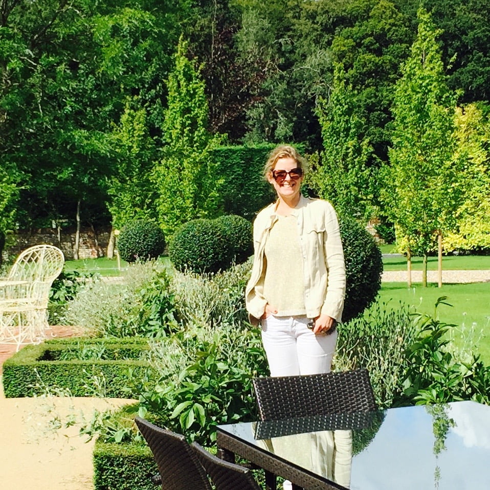 Jo Alderson Phillips in a French style garden she designed in Oxfordshire. www.joannealderson.com