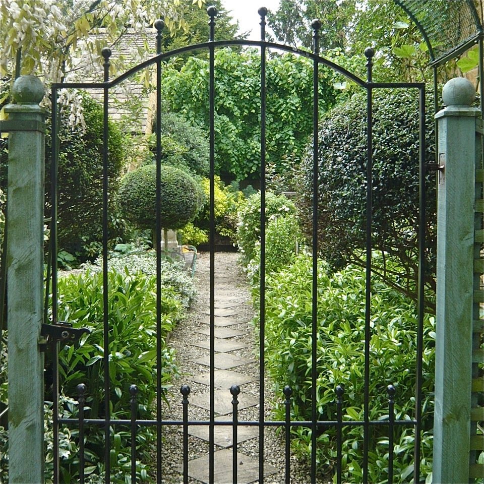 A pretty & inviting view into this Cotswold garden I designed 10 years ago