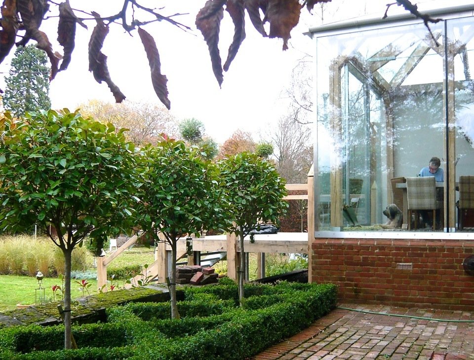 Our little knot garden beside our new extension. We later changed the brick to stone paving for a more contemporary look