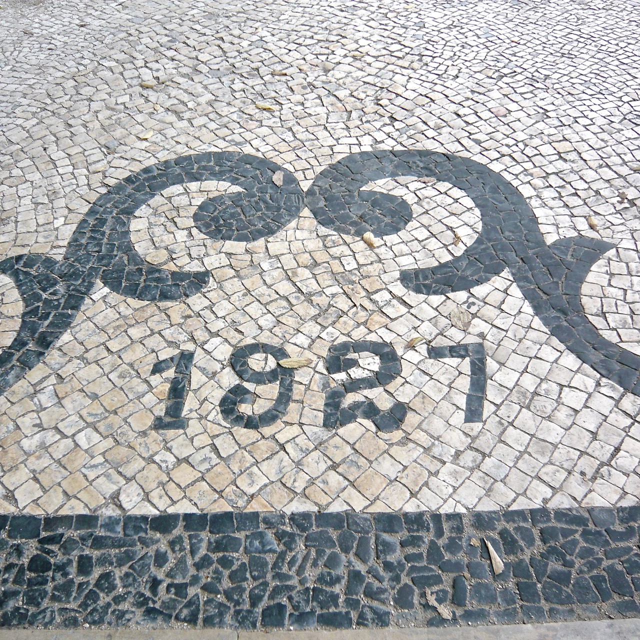 1927 date in Portugese pavement - blog by Jo Alderson Phillips of Joanne Alderson Design