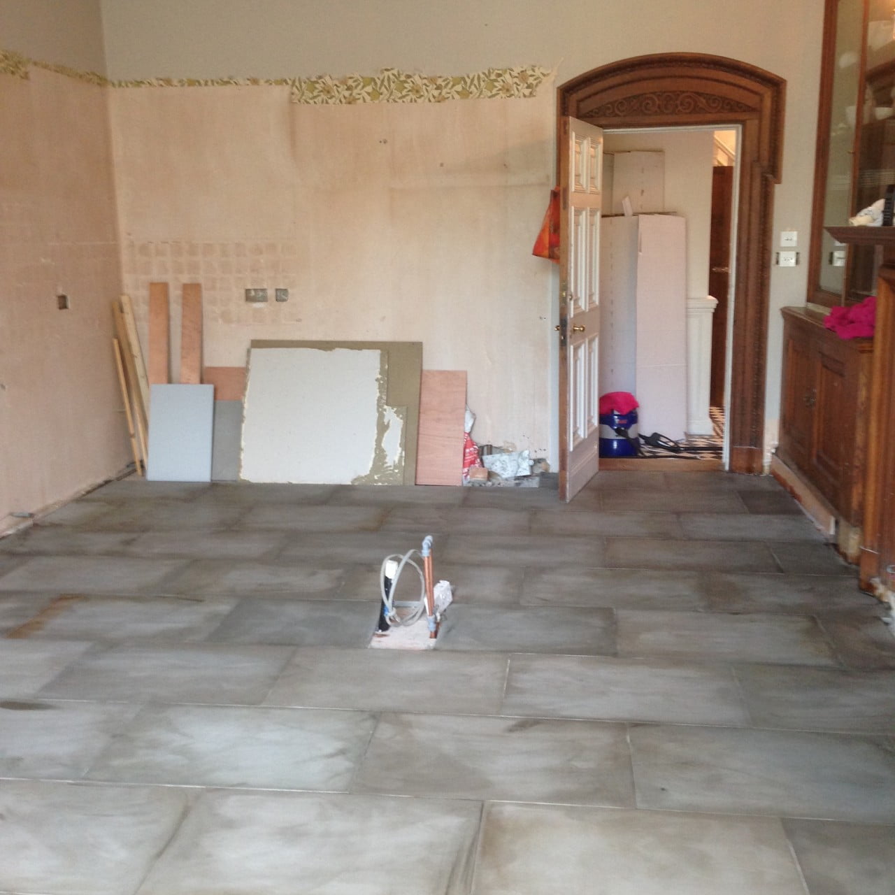 We transformed the kitchen at our Victorian house near Newbury. Here we'd just sealed the new stone floor. As you can see I don't just design gardens!