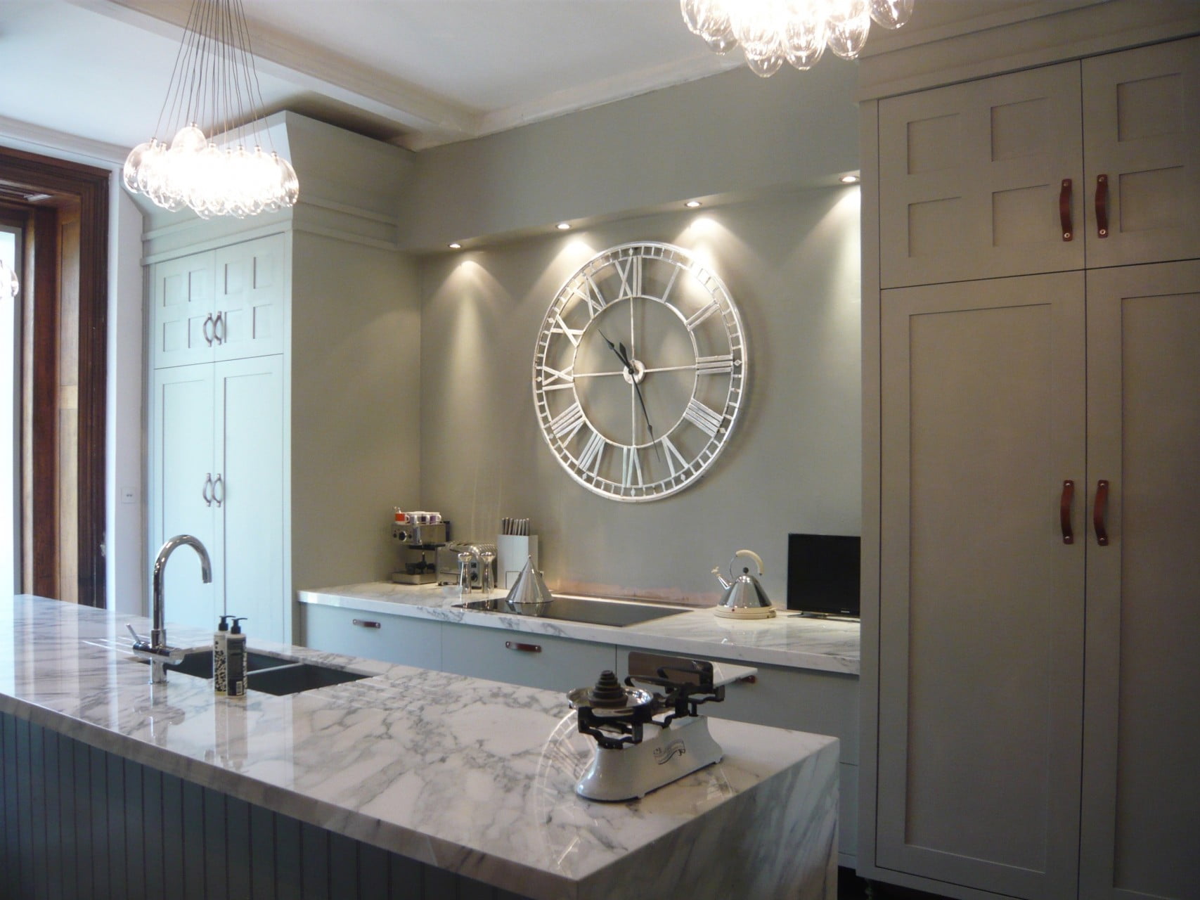 I redesigned our kitchen to make the most of the tall ceilings & to reflect the Victorian house we live in. It's contemporary - not pastiche