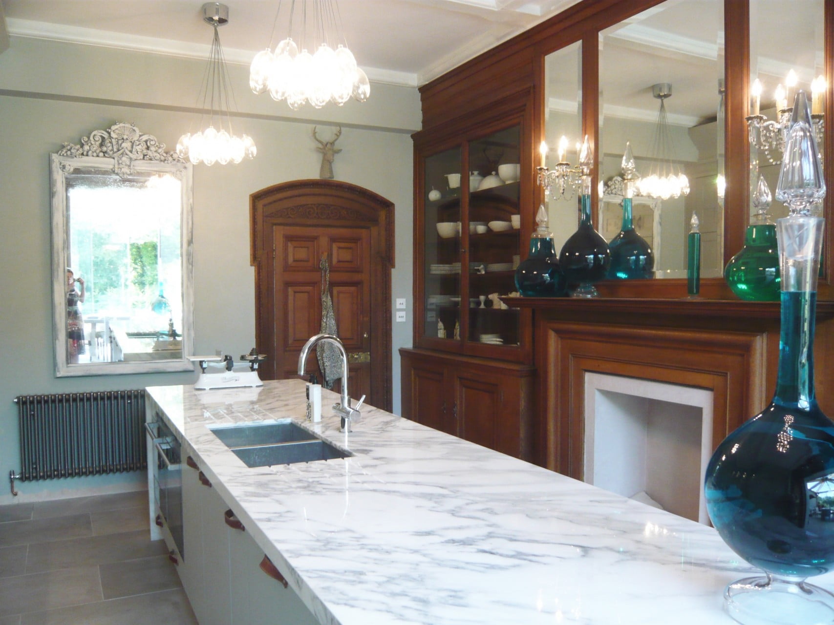 We redid the kitchen of our Victorian house & here it is now complete. I love the original Victorian panelling & the new scheme really shows it to the full. I don't just design gardens!