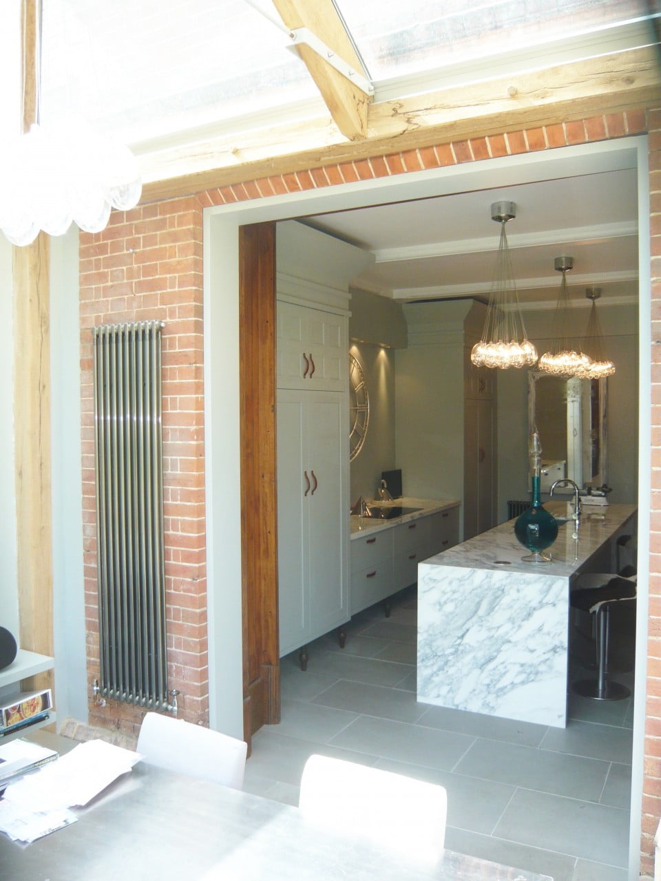 We redid the kitchen of our Victorian house & here it is now complete seen here from the dining room. I don't just design gardens!