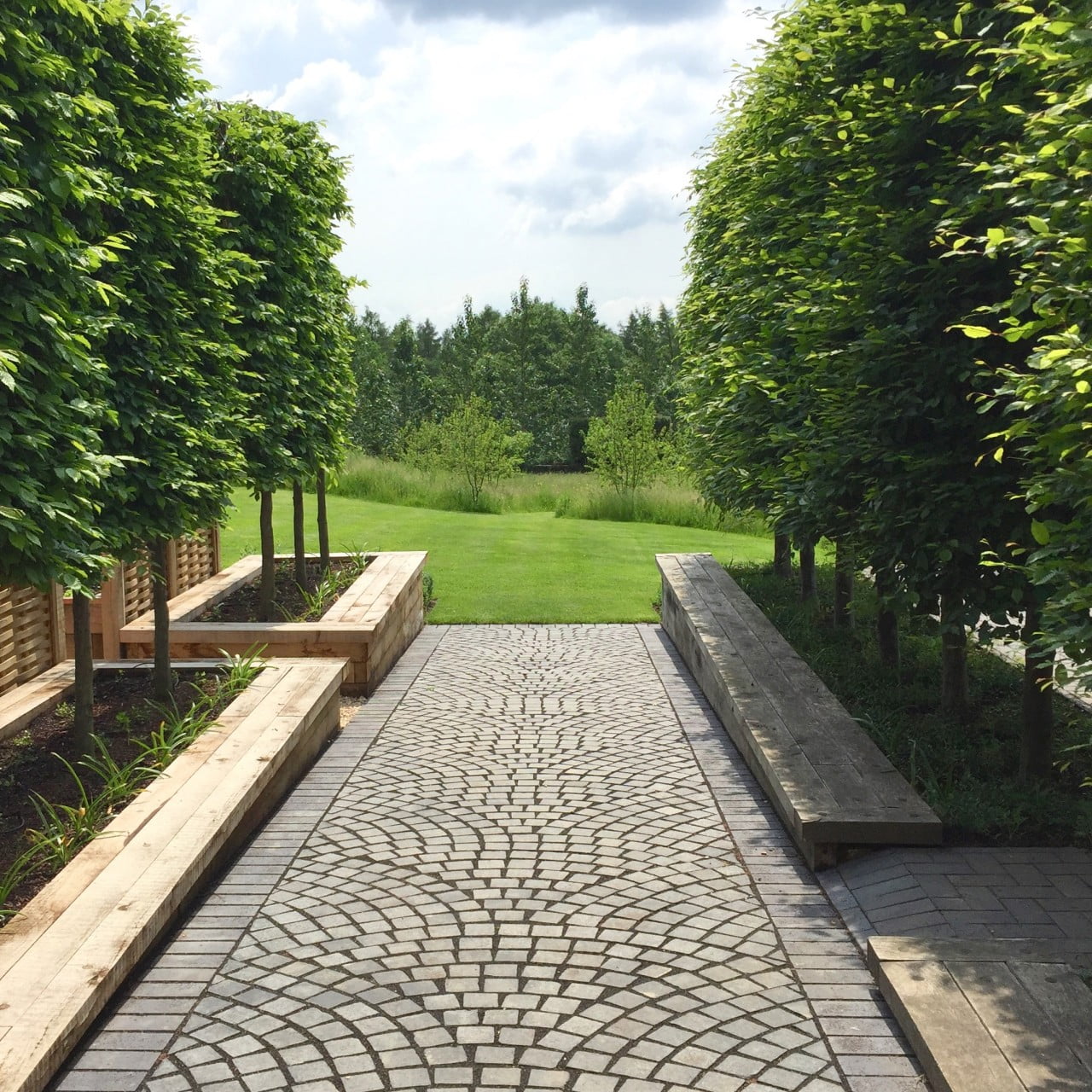 Beautiful ornamental setts as paving within the kitchen garden