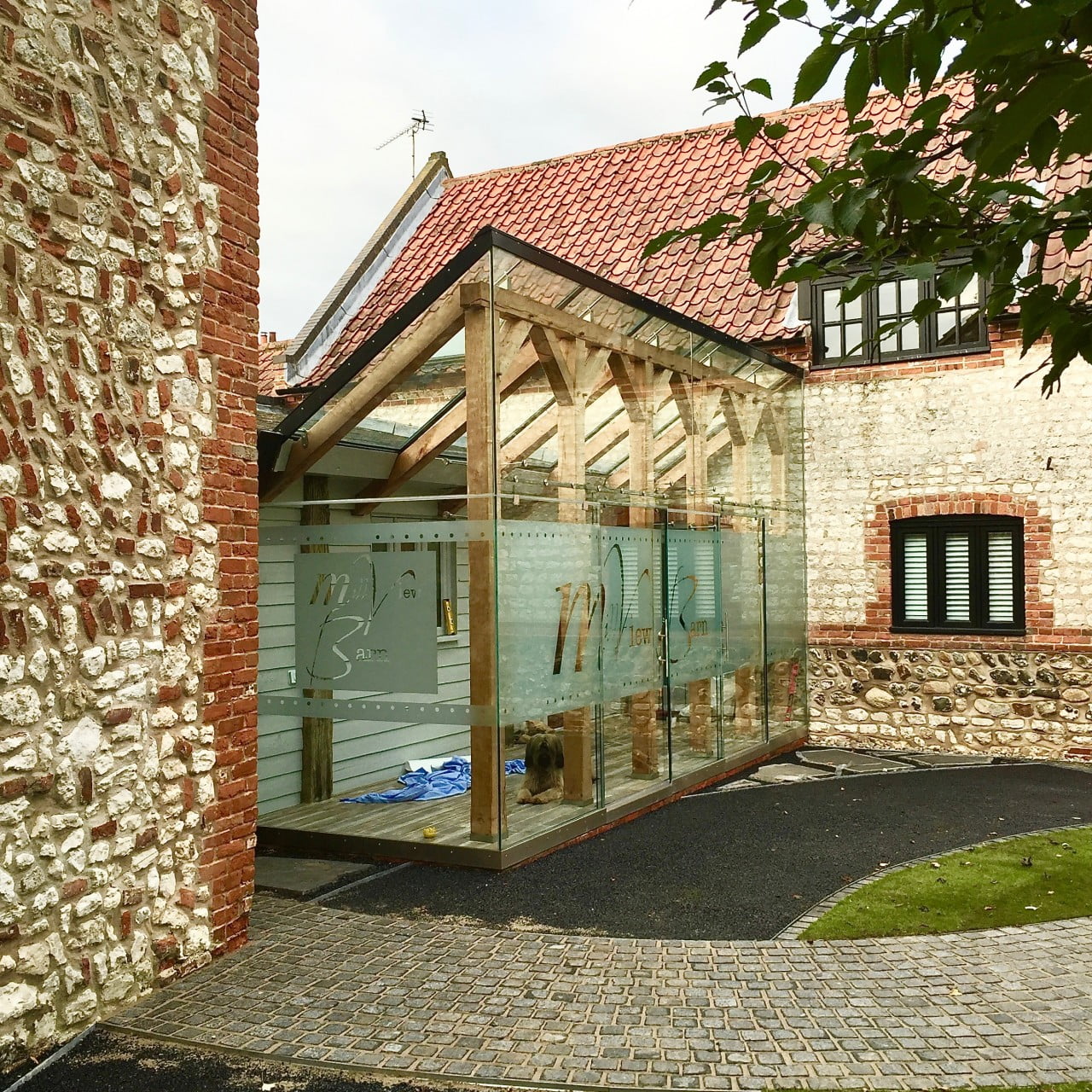 This is a glass box & oak framed extension by Igloo. I designed the text & installed t for my client
