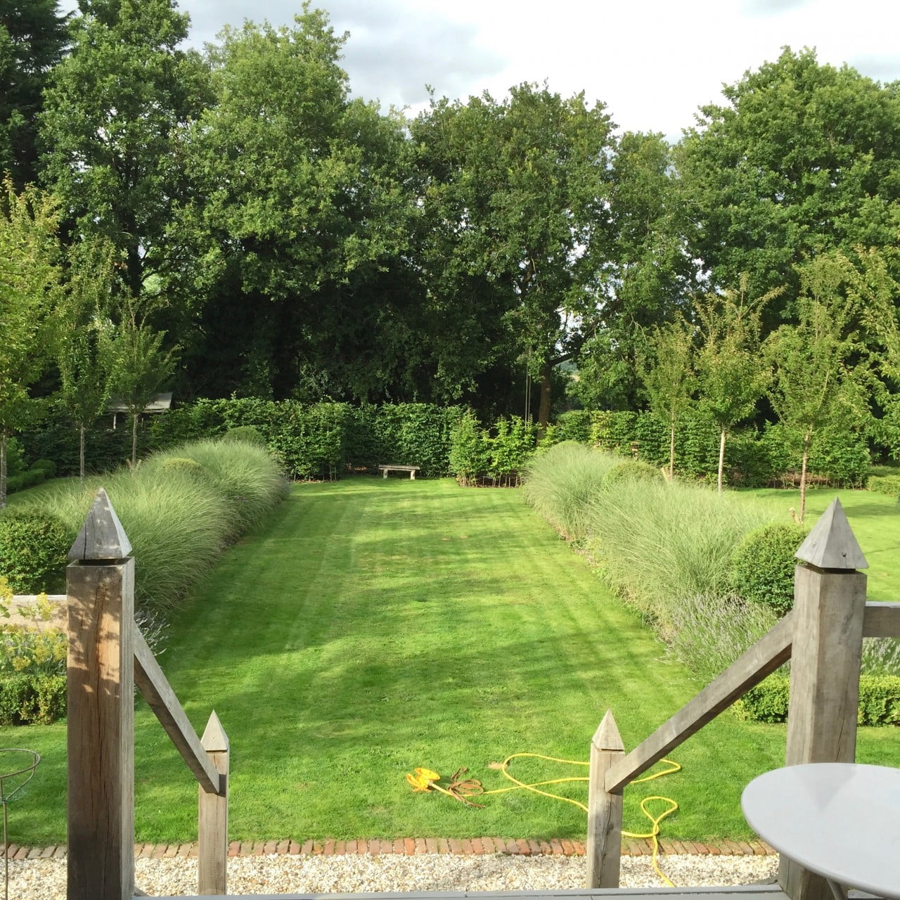 A view of our own garden here in newbury. It is a large formal garden with evergreen topiary & ornamental cherry trees