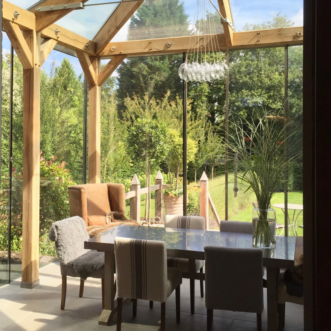 This is our own house & garden seeing through our contemporary oak framed dining room.