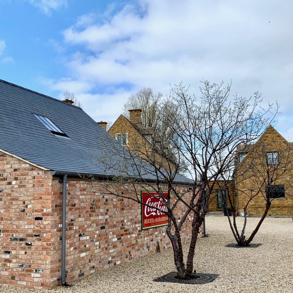 I love these multistemmed prunus serrula trees that I used to mark out parking spaces in this Cotswold garden I designed