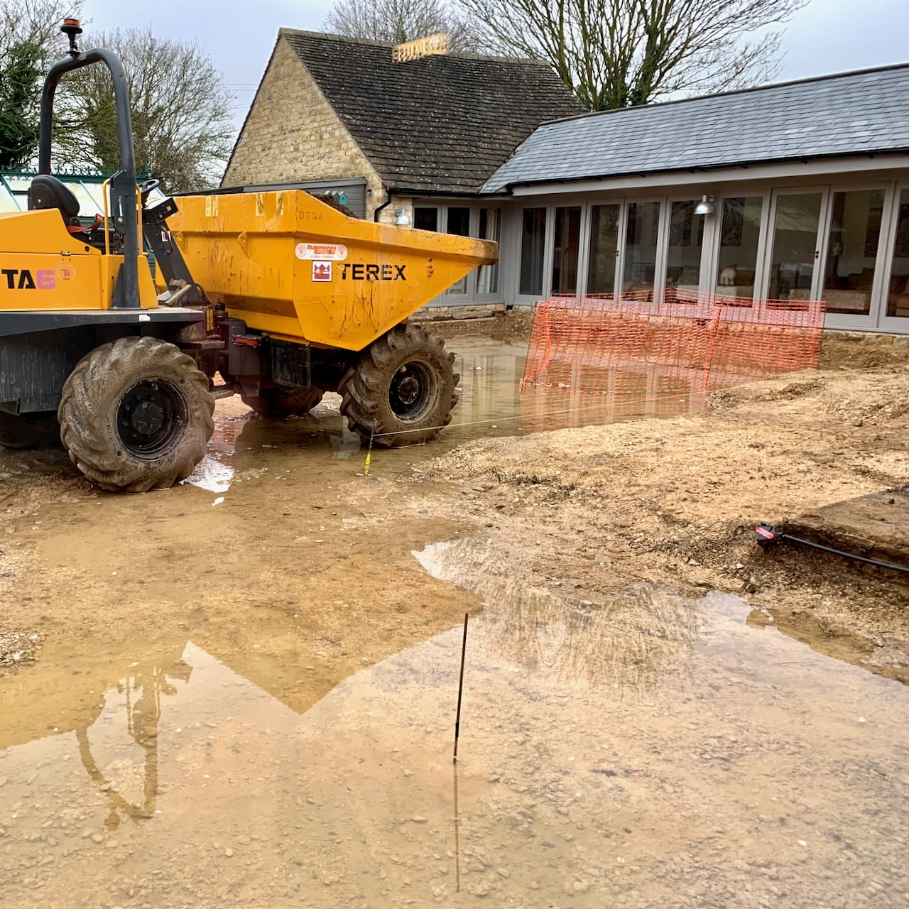 Building work has started at Manor Farm Barn but the water table is so high we have a flood