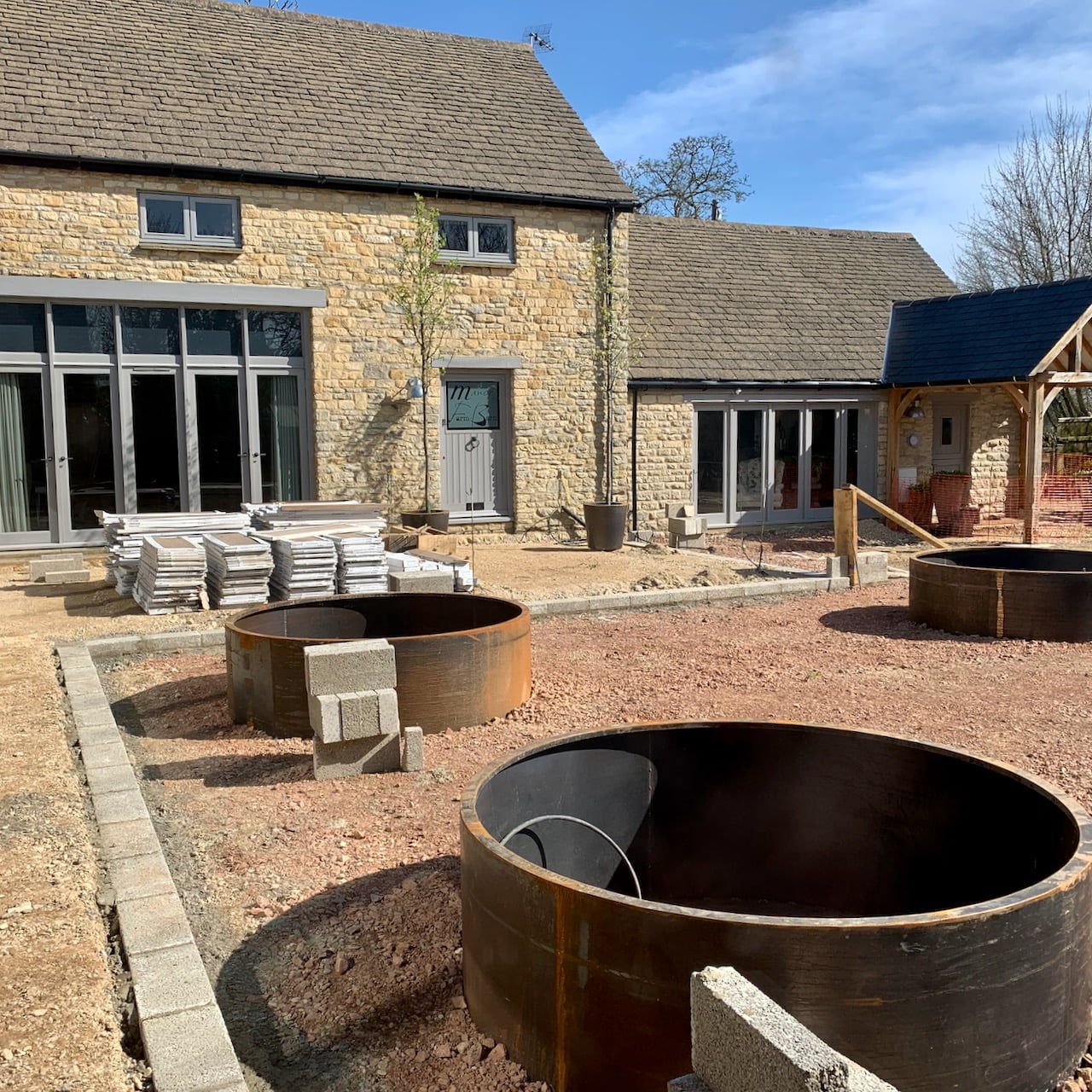 new planters in corten steel for the trees we can't plant due to the water table