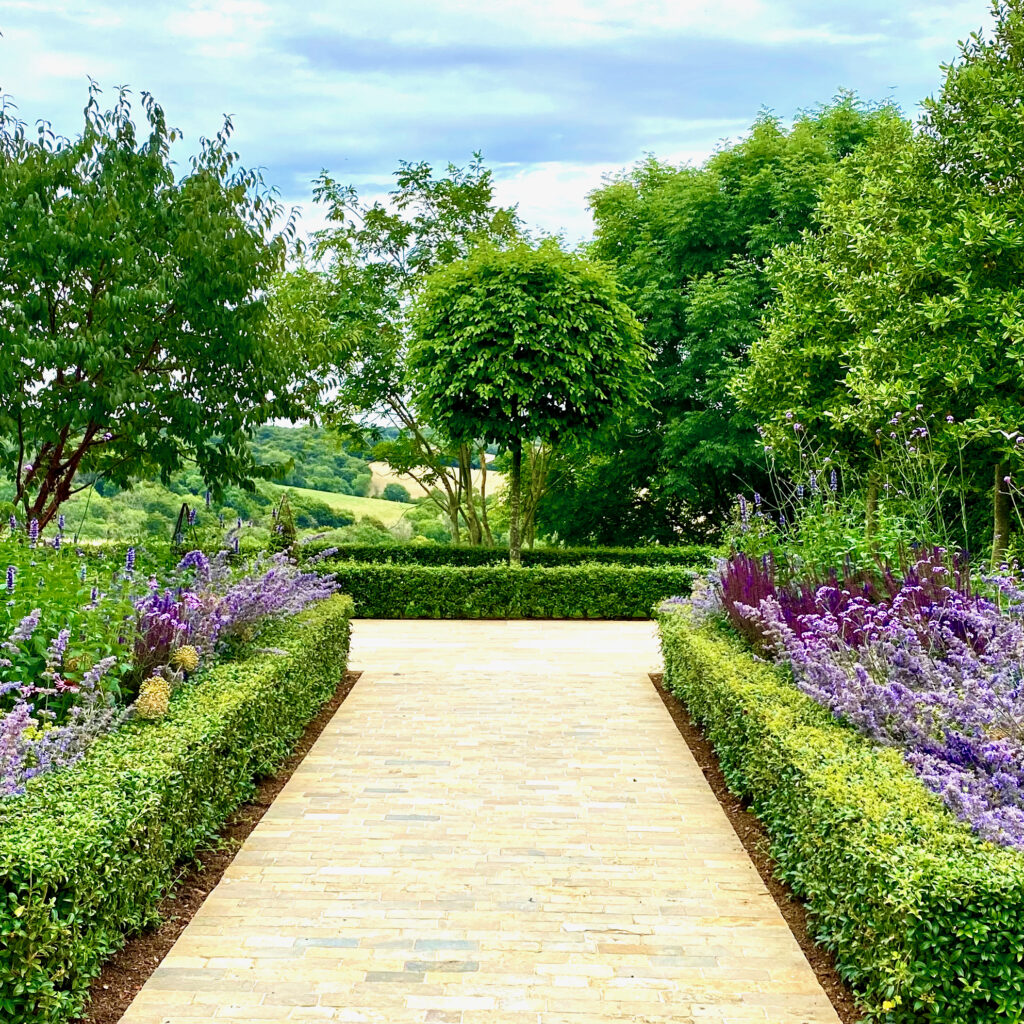 Pretty courtyard garden in Buckinghamshire by Joanne Alderson Design