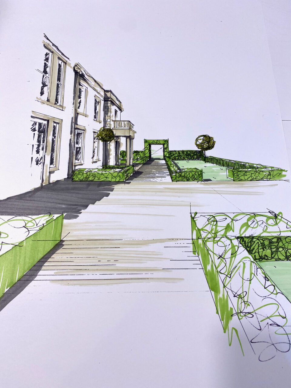 sketching out the rear terrace of a large Georgian house in Buckinghamshire