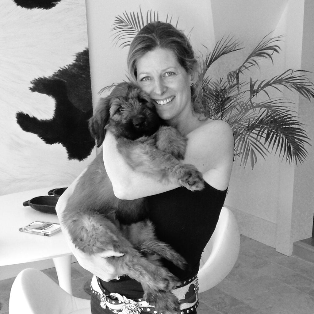 Jo Alderson Philips at home in Henley with Charlie as a puppy
